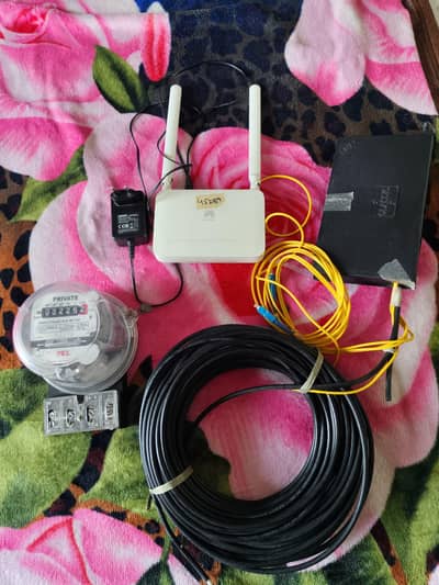 complete fiber internet set-up (Huawei router, cable roll)&submeter