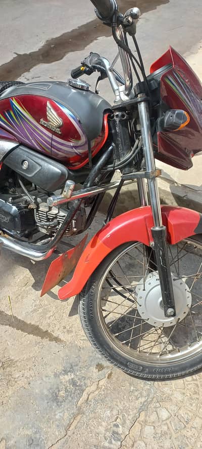 Honda prider 100cc03336861390