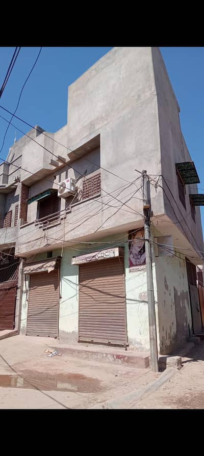 3 marla corner triple story | urgent sale | 2 shop | main road view |