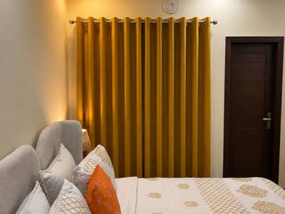 Curtains in mustard colour
