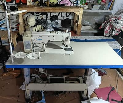 like new Singer sewing auto full lifter mechine joki