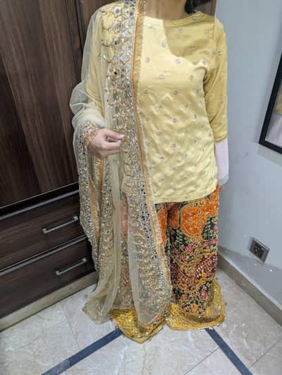 Heavily mirror embroidered lehenga with top and dubatta