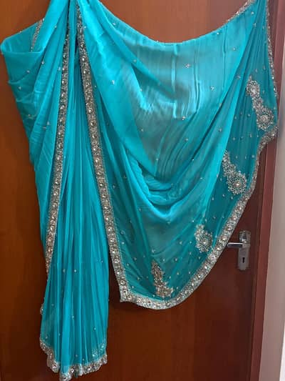 Elegant Turquoise Embellished Saree