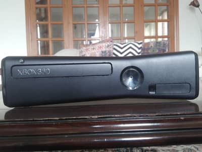 Xbox 360 Slim for sale.