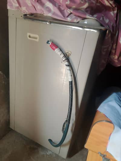 washing machine side pipe toot gya tha or dhakan alg ho gya he n