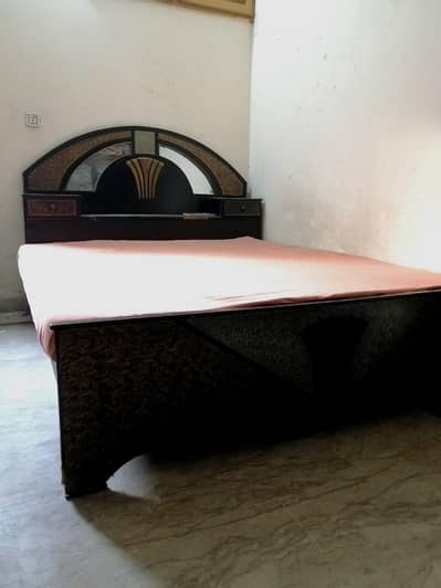 Bed, dressing table and show case