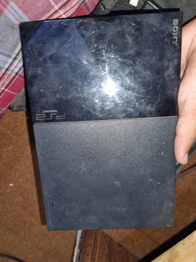ps 2 with box  with grafic card 10/9.5 with two controler no leel brea