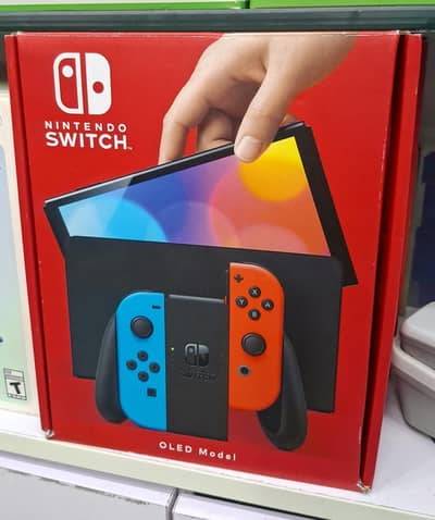 nintendo switch oled with 2 games