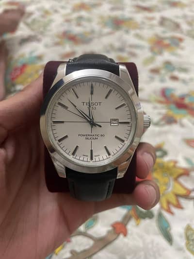 Tissot white dial black strap watch