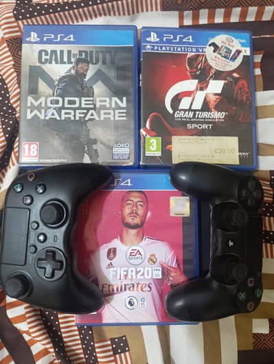ps 4 with 3 games and two controllers