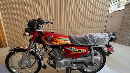 Honda 125 (red)