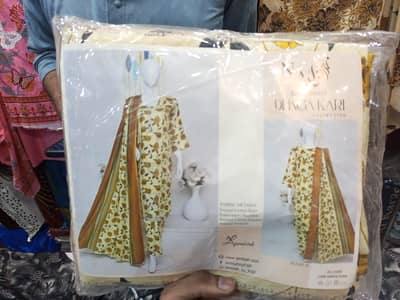 embroidery & printed un stitch suits available 03110264461