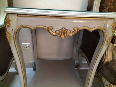 Two sofa chairs with center table