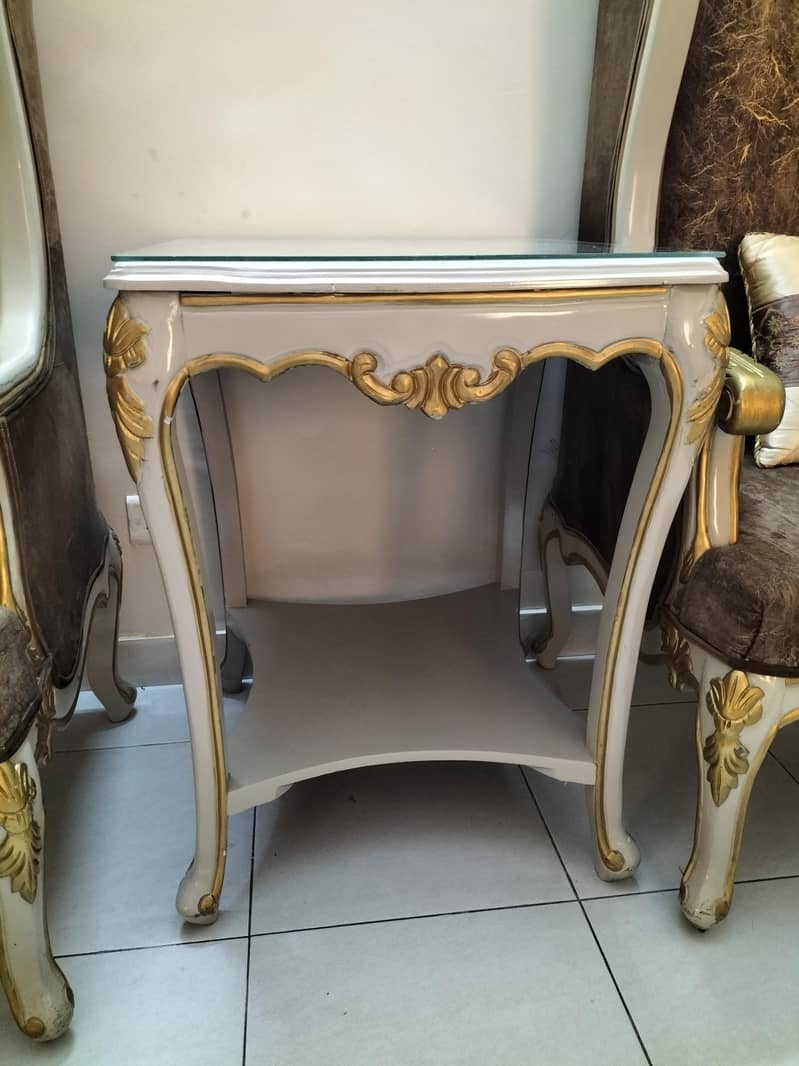Two sofa chairs with center table 2