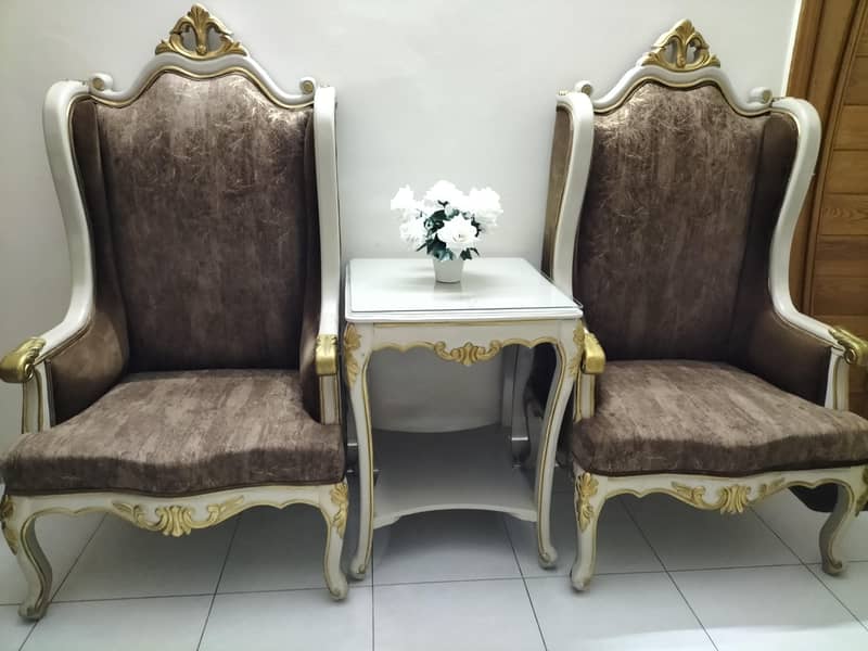 Two sofa chairs with center table 9