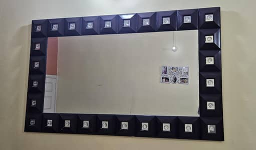 Elegant wooden wall mirror