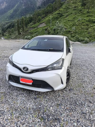 Vitz pearl white