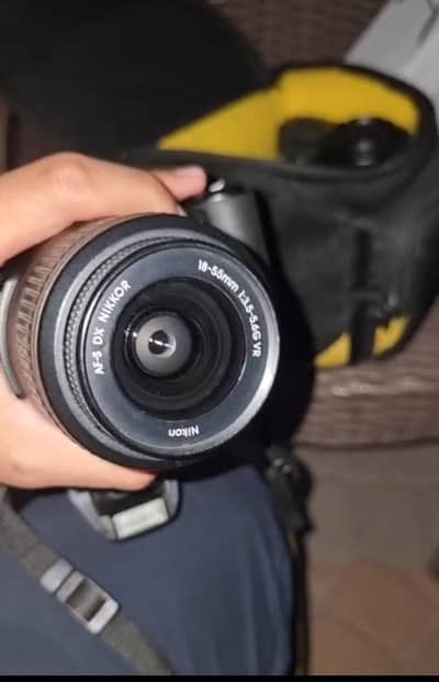 Nikon D5100 with 18-55mm lens + 55-200mm lens