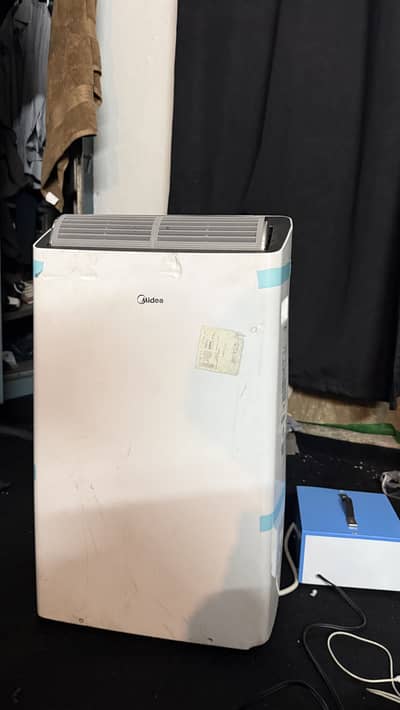 1.3 ton Midea Portable AC with supply converter