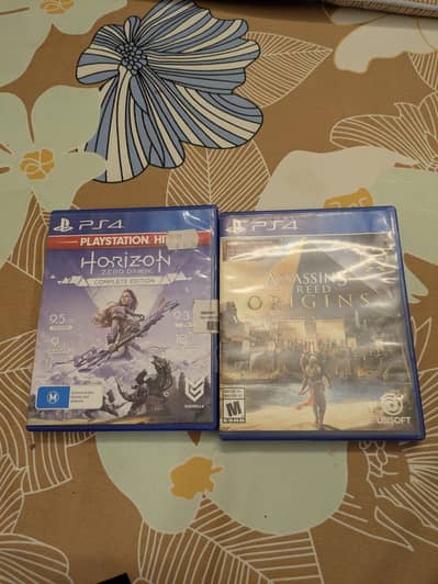 PS4 game assassin's Creed origins and horizon zero dawn complete
