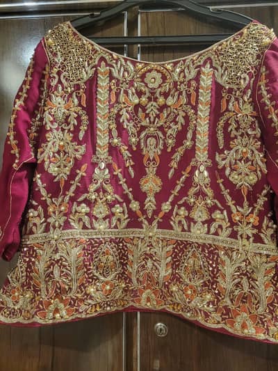 Barat lehnga and choli with potli.