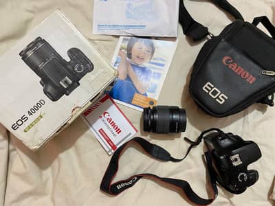 Canon Eos4000D DSLR camera with 18-55mm Lens complete box and bag