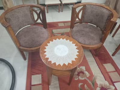 coffee table with two chairs