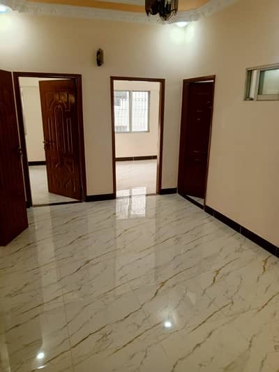 1000SQFT APARTMENT FOR RENT IN DHA PHASE 7 EXT. THREE SIDES CORNOR BUILDING. THREE BEDROOMS APARTMENT.