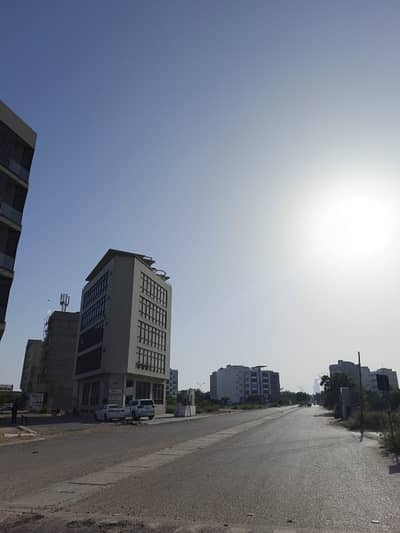 100 SQUARE YARD COMMERCIAL PLOT FOR SELL IN DHA PHASE 7 EXT.