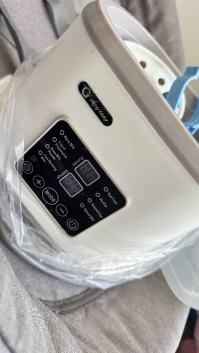 Milk and food warmer and sterlizer