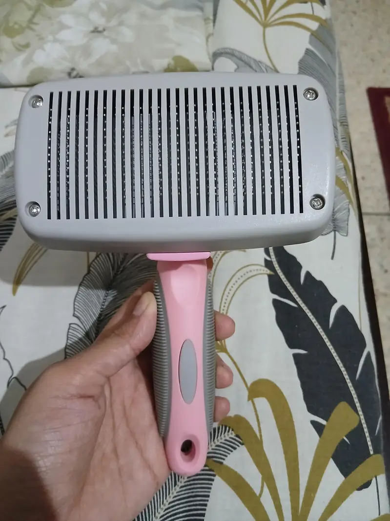 Grooming button brush