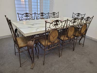 WROUGHT IRON VERY HEAVY AND EXPENSIVE DINING TABLE 8 CHAIRS
