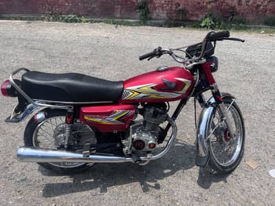 Honda 125   Rawalpindi number full ok hai model 1995 price 99000