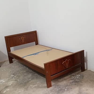 2 single wooden beds for sale