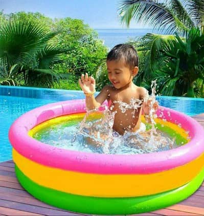 Rainbow inflatable pool for kids balcony play.