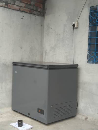 higher freezer new condition 10 by 10 urgent sale just one month used