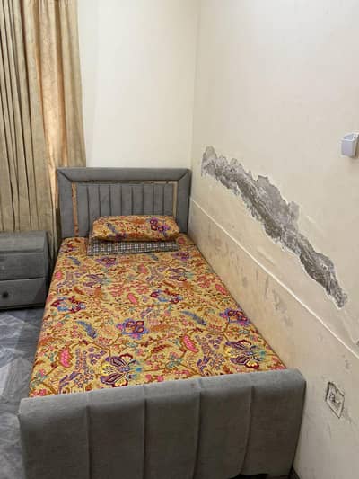 bed with side table