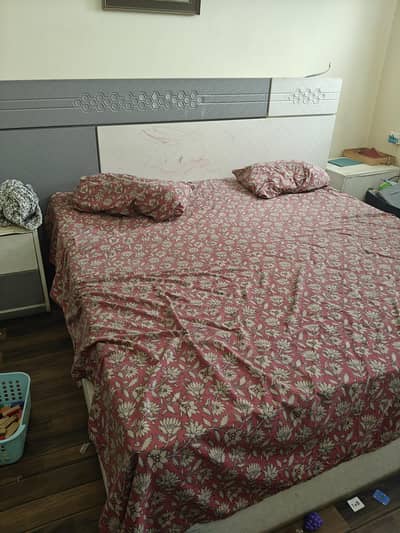 double bed with 2 side tables