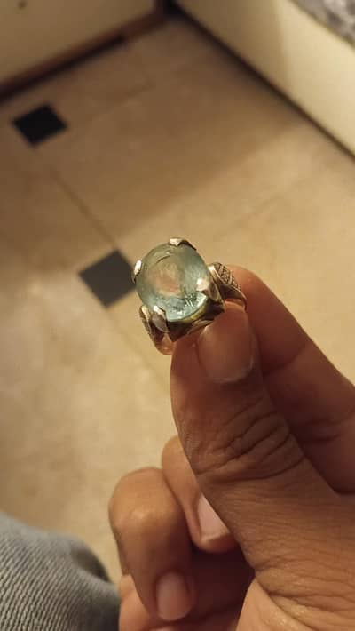 Aquamarine gem with ring