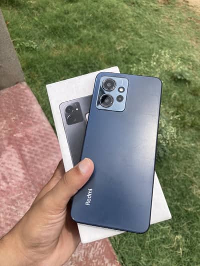 Xiaomi Redmi Note 12 with box and charger