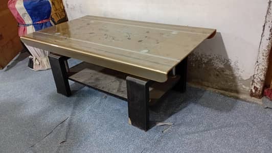 Glass top used table