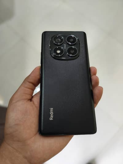 Xiaomi Redmi Note 14 Pro with box and charger