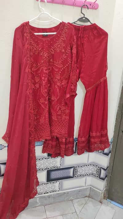beautiful red rose color. embroidered shirt, dupptta and sharara