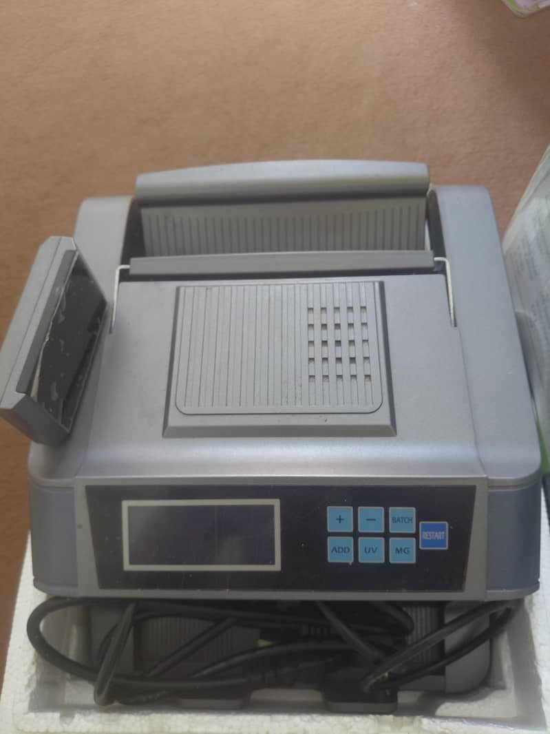 Cash counting machine for accurate note detection in Pakistan 2