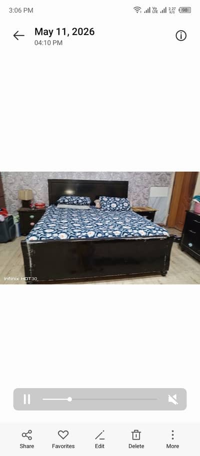 Bed set with dressing and side tables and another bed and center tabl