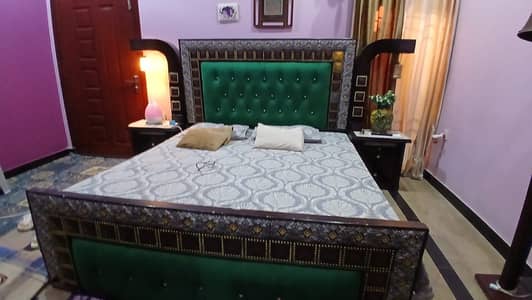 King size bed with side tables and dressing