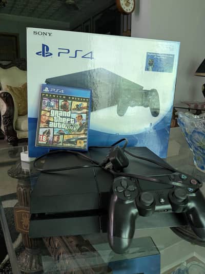 PS4 FAT 1 TERABYTE WITH BOX AND GTA 5 CD