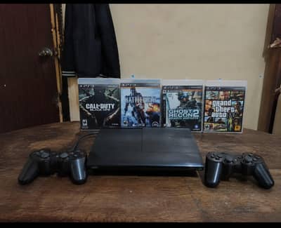 PS3 super slim | 2 original controllers | with cds