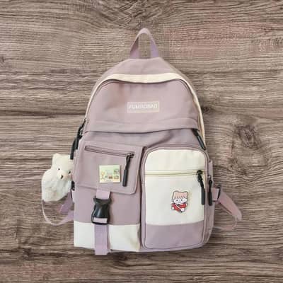 Girls pink oxford school backpack with 6 pockets.