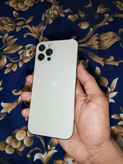 Exchange iPhone 12 Pro 128 GB face id true tone ok FU model Read add
